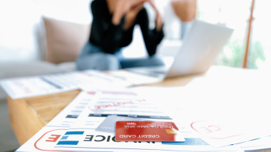 Stressed young woman has financial problems credit card debt to pay uttermost