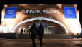 Participants walk into Davos Kurpark Village prior to the opening of the annual meeting of the World Economic Forum in Davos, Switzerland