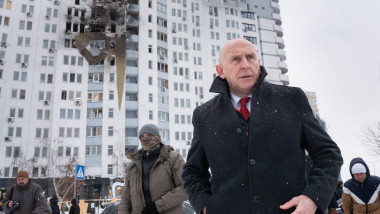Defence Secretary John Healey meets emergency service workers at the scene of last night's drone attack which hit a residential area in the east of Kyiv, killing one person. The British cabinet minister is on a one day visit to the Ukrainian capital where