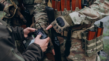 Ukrainian military coordinating a drone during battle