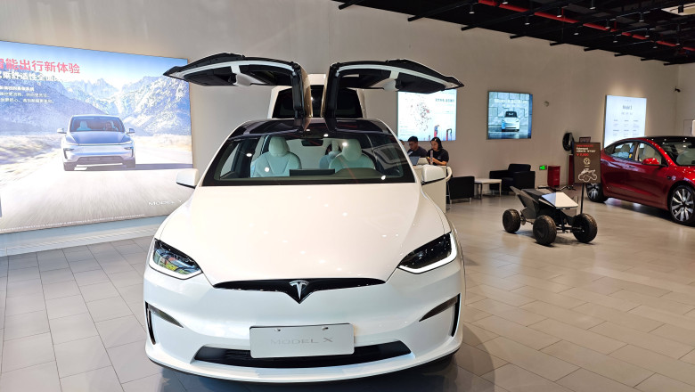 SHANGHAI, CHINA - AUGUST 19: A Tesla Model X is on display at a Tesla store on August 19, 2025 in Shanghai, China. Tesla