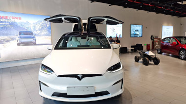SHANGHAI, CHINA - AUGUST 19: A Tesla Model X is on display at a Tesla store on August 19, 2025 in Shanghai, China. Tesla