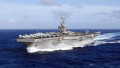 Nuclear-powered aircraft carrier USS Abraham Lincoln (CVN-72) transits the South Pacific as part of Carrier Strike Group Nine, supporting the Fleet Response Plan and surge deployment operations under the Chief of Naval Operations.