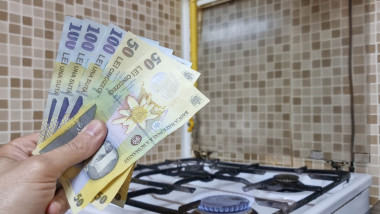Energy efficiency concept with gas cooker and LEI, the Romanian money – the cost of natural gas is more expensive in Romania. Selective focus