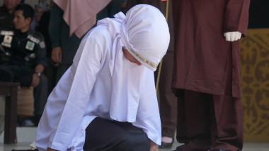 Three Couples Who Violated Sharia Law Were Executed By Caning In Banda Aceh, Aceh, Indonesia.