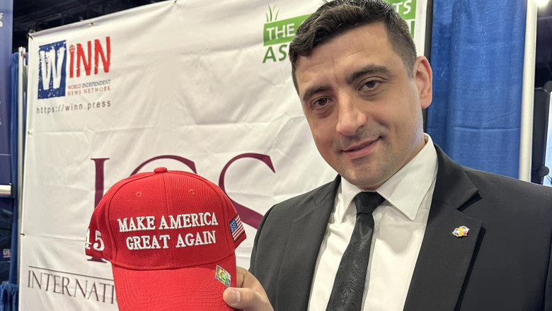 george simion cu o sapca rosie maga in mana