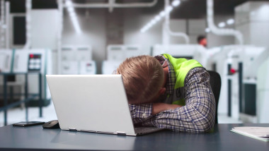 Bored Man Sleeping At Work