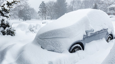 Car Buried Under Deep Blizzard Storm Snow