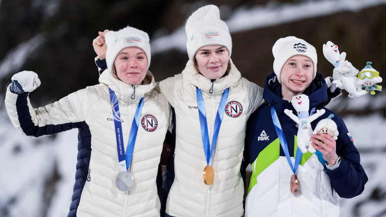 Val di Fiemme, Italy 20260215. Anna Odine Stroem with the gold medal on the podium after jumping the women's large hill in the Predazzo Ski Jumping Stadium during the Winter Olympics in Milano Cortina 2026. Photo: Terje Pedersen / NTB This text is auto