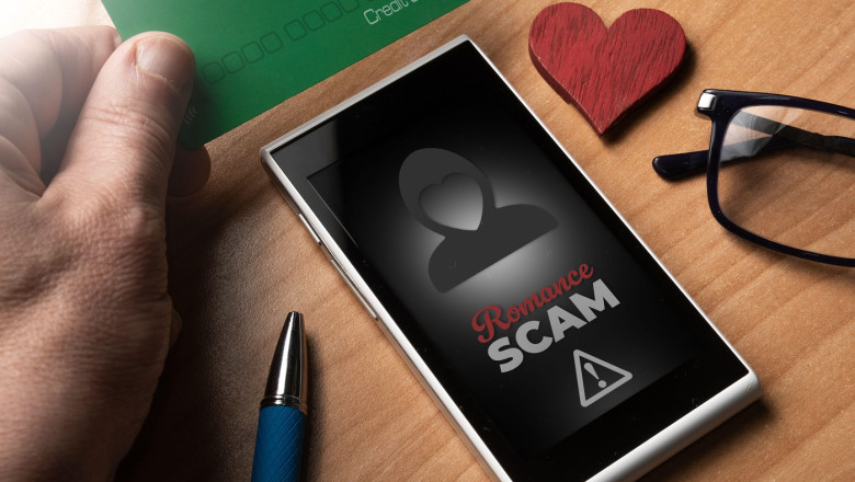 Romance scam concept: man use a credit card to pay for a love scam