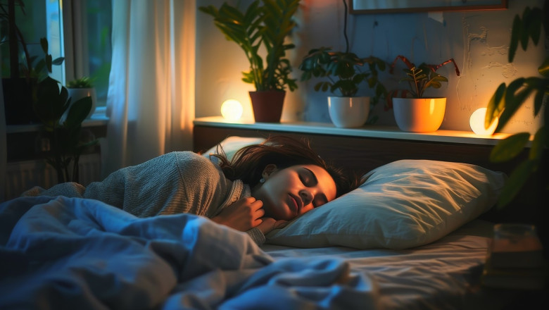 A woman sleeps in her bedroom.