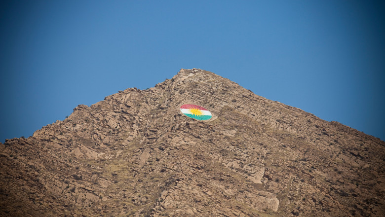 Kurdistan flag on a hillside in Dohuk, Kurdistan, Iraq