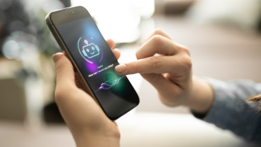 Woman using AI chatbot.