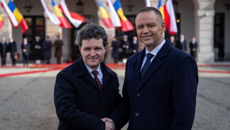 Karol Nawrocki și Nicusor Dan dau mana