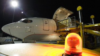 Gdansk, Poland 19th, September 2013 DHL Poland launches new Boeing 737-300f cargo aircraft on the Tallinn - Gdansk - Leipzig. New aircraft can carry over 16 tons of goods. Pictured: DHL 737-300F cargo plane sits at Lech Walesa Airport in Gdansk during loa