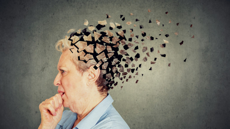Senior woman losing parts of head feeling confused as symbol of decreased mind function.