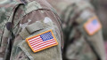 US soldiers. US army. USA patch flag on the US military uniform. United States Armed Forces. Veterans Day.