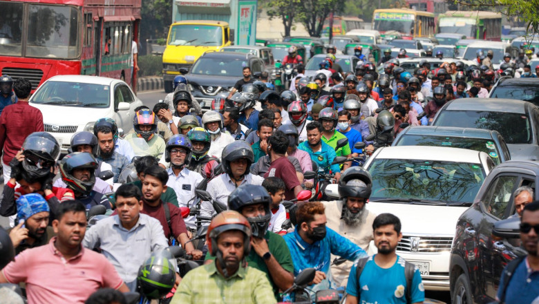People wait in a long queue as they rush to petrol pumps to refuel amid fears of a fuel shortage in Dhaka, Bangladesh, on Saturday, March 7, 2026. Long lines of motorcycles and private cars formed across the capital as motorists hurried to fill their tank