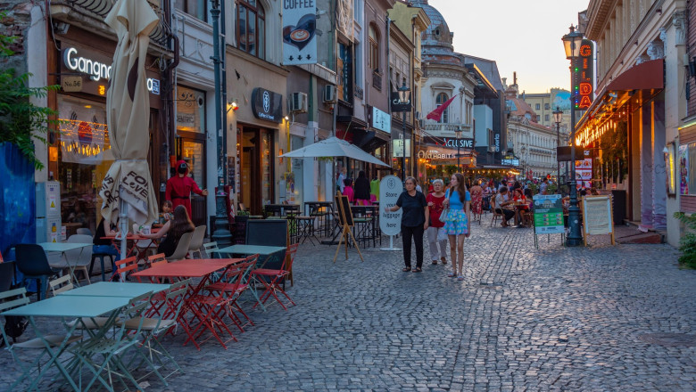 Bucharest, Romania, August 20, 2023: People enjoying nightlife in the old town of Bucharest, Romania