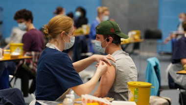 A student receiving an injection in the sports hall at the University of Kent campus in Canterbury as the number of cases of meningitis being investigated by the UK Health Security Agency (UKHSA) in Kent has risen to 27. Picture date: Thursday March 19, 2
