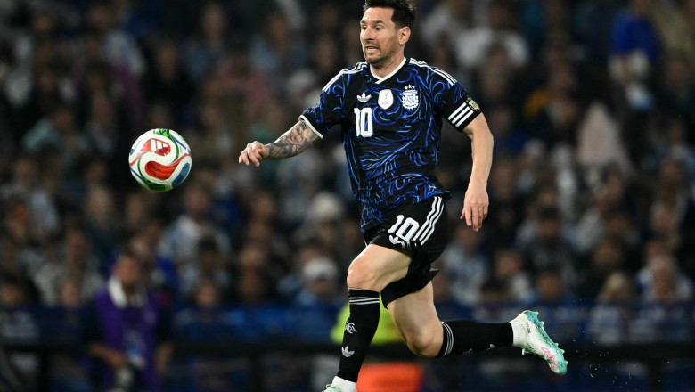 Lionel Messi runs for the ball during a friendly football match between Argentina and Mauritania