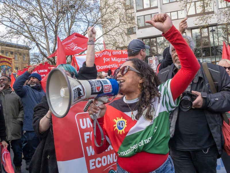 London, UK. 28 March 2026. People shout defiantly at a handful of counter-protesters withj Izraeli flags and Pahlavi Iranian flags. More than a hundred thousand came to march though London against the growing division and hatred being spread by the far ri
