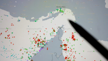Paris, France - March 16, 2026: A pen indicates the Strait of Hormuz on a Marine Traffic map, symbolizing maritime analysis and strategic planning