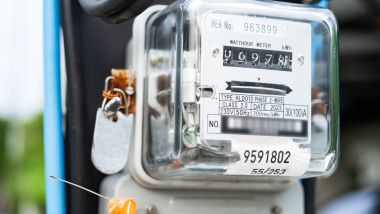 Electric measuring power meter for energy cost at home and office.