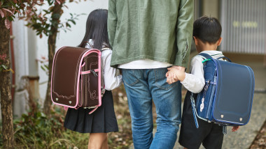 Single Japanese Father Taking His Young Children to School