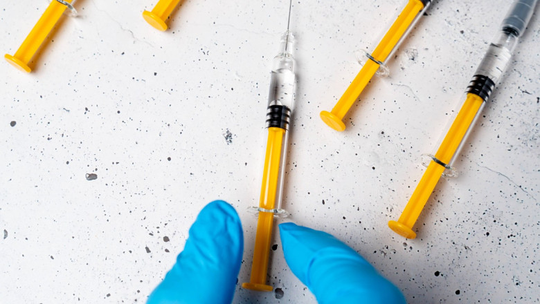 Bavaria, Germany - March 20, 2026: FOTOMONTAGE, Several syringes on one surface. Symbol for vaccines, various diseases a