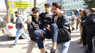 injured student evacuated as special force security surround the school in southeastern Turkey
