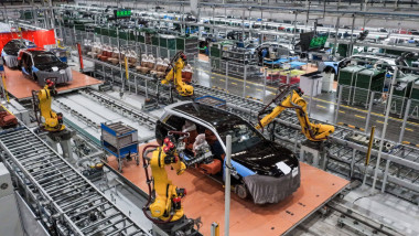 CHONGQING, CHINA - APRIL 02: Intelligent robotic arms install seats for new energy vehicles at Seres Super Factory on Ap
