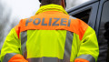 Ottobeuren, Bavaria, Germany April 15, 2026: A police officer wearing a high-visibility vest during a traffic stop in a