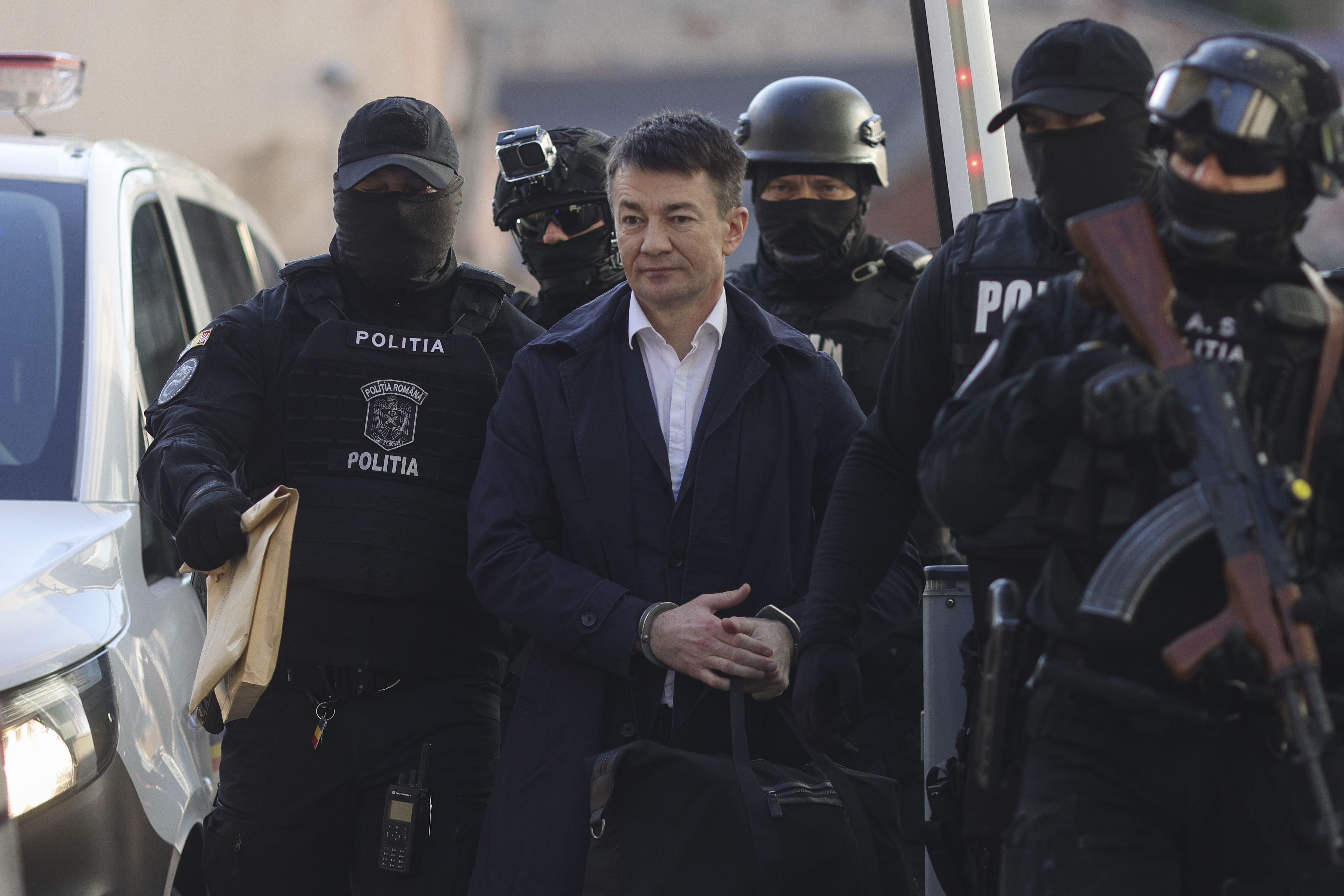 Imagini cu extrădarea lui Alexandru Bălan, fostul director adjunct al Serviciului de Informații din Moldova care a spionat pentru KGB