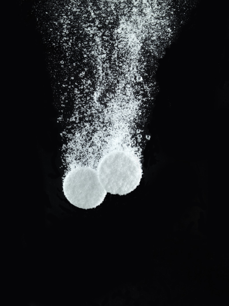 Soluble pills in water, close up