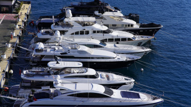 Aerial view of luxury yachts densely moored in Port Hercule marina, Monaco. Monte Carlo, Monaco