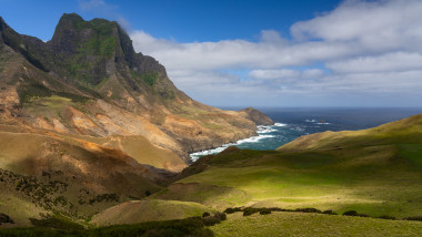 Scenic view of sea and mountains against sky,Robinson Crusoe Island,Chile