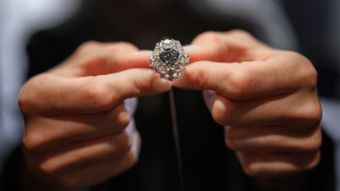 triangular-shaped fancy vivid blue-green diamond weighing 5.50 carats, known as "The Ocean Dream"