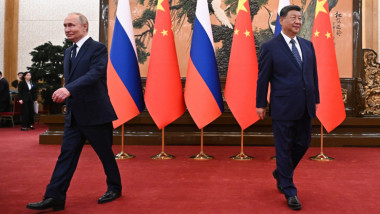 Vladimir Putin și Xi Jinping.