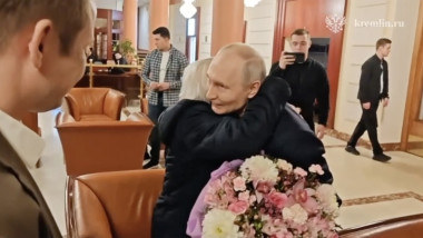 Vladimir Putin, 73, drives himself in an Aurus off road to meet his former schoolteacher Vera Gurevich, 92, at a Moscow hotel, then takes her out to dinner in the Kremlin.