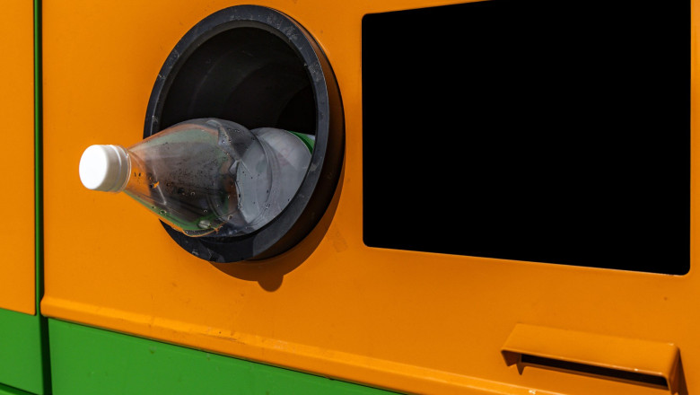 Return of empty used plastic bottles in the bottle vending machine, damaged bottle return machine, jammed bottle in the bottle vending machine, enviro