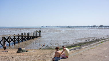 Heatwave, currently 31 degrees in Southend Great Britain 26th May 2026 Approx 12pm People sunbathe on the beach at Southend on sea, Essex