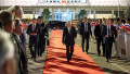 Vladimir Putin walks at Beijing Capital Airport as he departs Beijing on May 20, 2026