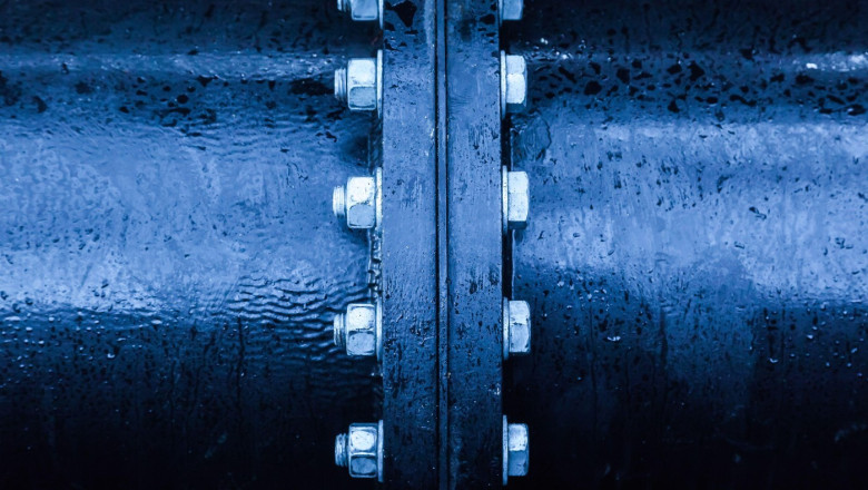 Large pipe connection with a large number of bolts and nuts enclosed on it. Pipeline. Pipeline state transportation system.