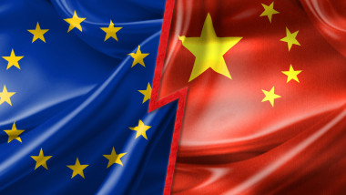 European Union and China flags split by a jagged line representing a political and economic conflict