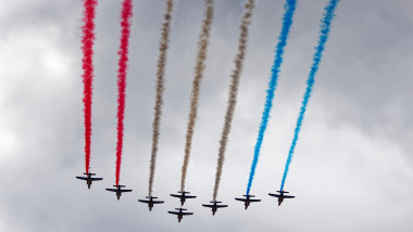 Paris, France. 14th July, 2025. Patrouille de France with 8 Alphajets in a Grande arrow formation. The French National Day (Bastille Day) is celebrated on Monday July 14, 2025 with the military parade from the Champs-Elysées, in the presence of the Presid
