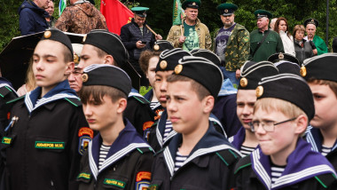 Cadets attend a flag-raising ceremony aboard the Shmel class (Project 1204) armoured patrol boat