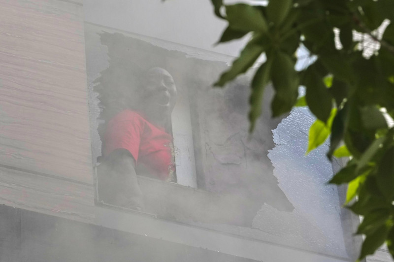 Photos show a rescue operation in a New Delhi hotel fire