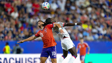 Scotland forward Che Adams (10) and Haiti defender Ricardo Ade (4) compete for a ball in a FIFA World Cup 2026
