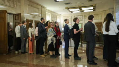 Students queue for a traditional ceremony in which students are treated to medovukha, a honey-based alcoholic beverage, to mark Russian Students Day at the Moscow University Library